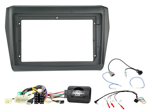 Grey double-DIN fascia panel with Connects2 steering wheel control interface, wiring harness, aerial adapters and ignition key connectors, for fitting a 9-inch aftermarket stereo into a Suzuki